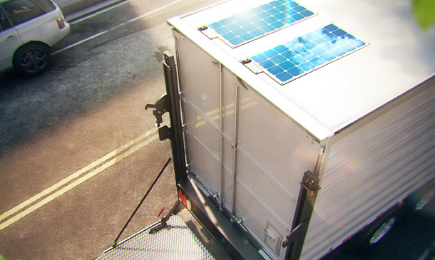 Photo of solar panels on the back of a trailer.