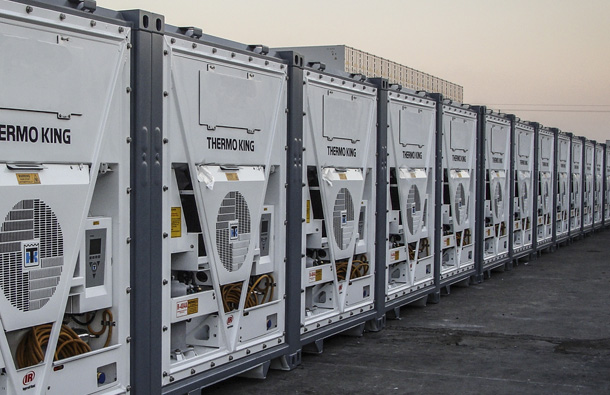 Photo of a line of Magnum units on shipping containers.									