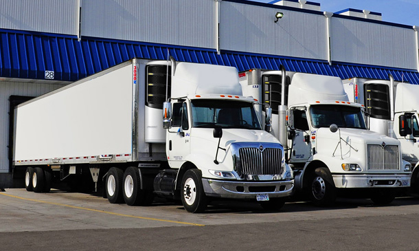 Photo of trucks at a loading dock with Precedent units.