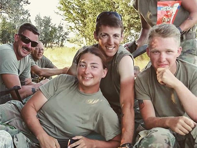 Brittany posing for a group photo with her fellow soldiers.