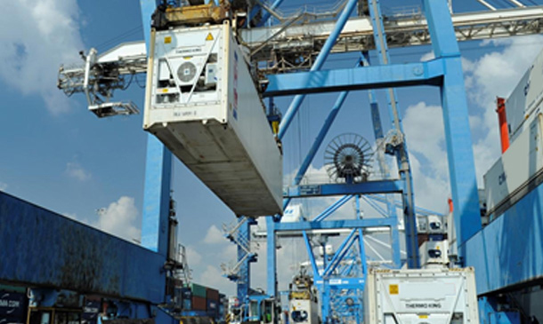 Photo showing Magnum Container being lifted onto a ship