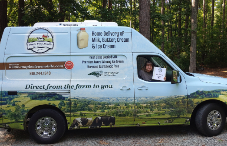 Jerry Richardson in front of a delivery van with a Thermo king unit