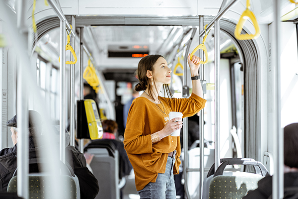 Person on a bus benefiting from Thermo King's Air Purification Solution